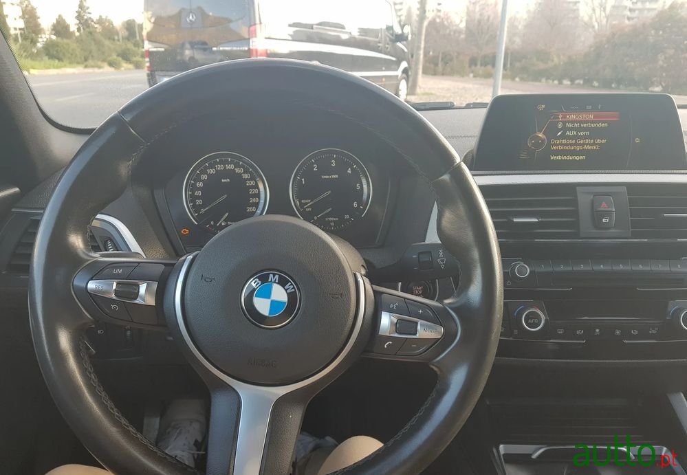 2015' BMW 116 D Edynamics Line Sport photo #2