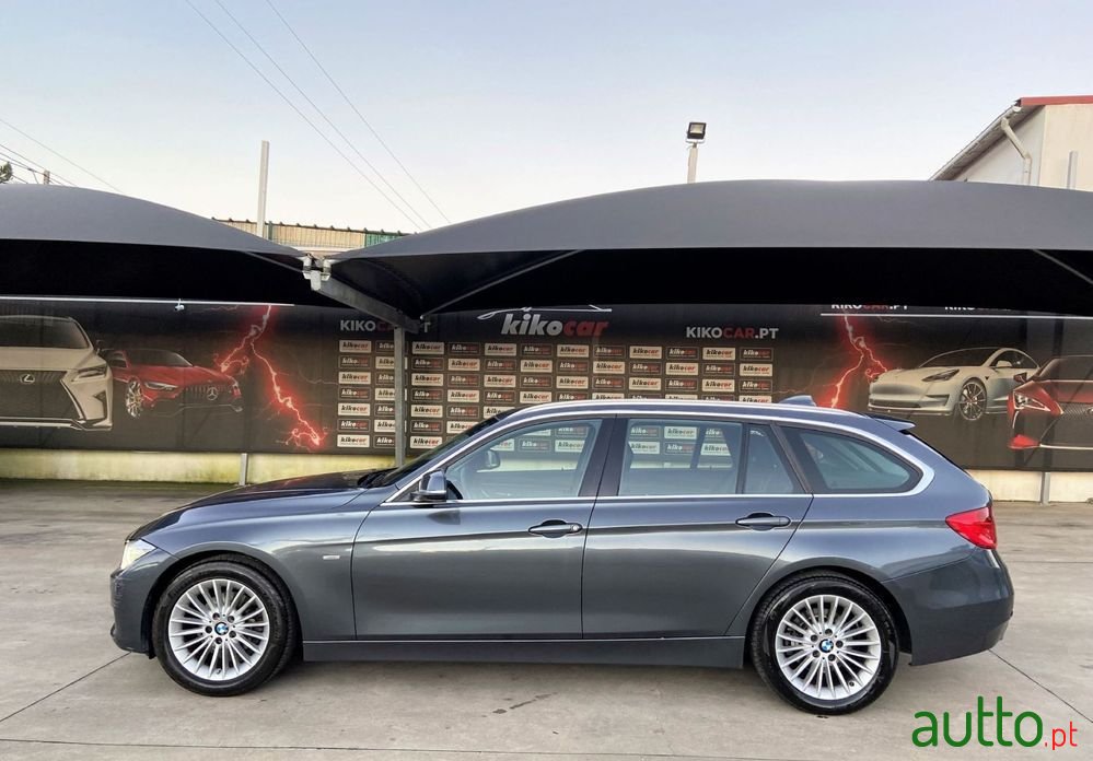 2014' BMW 318 photo #2