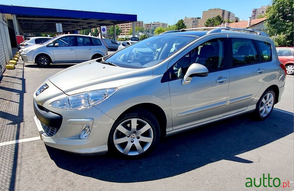 2009' Peugeot 308 Sw photo #1