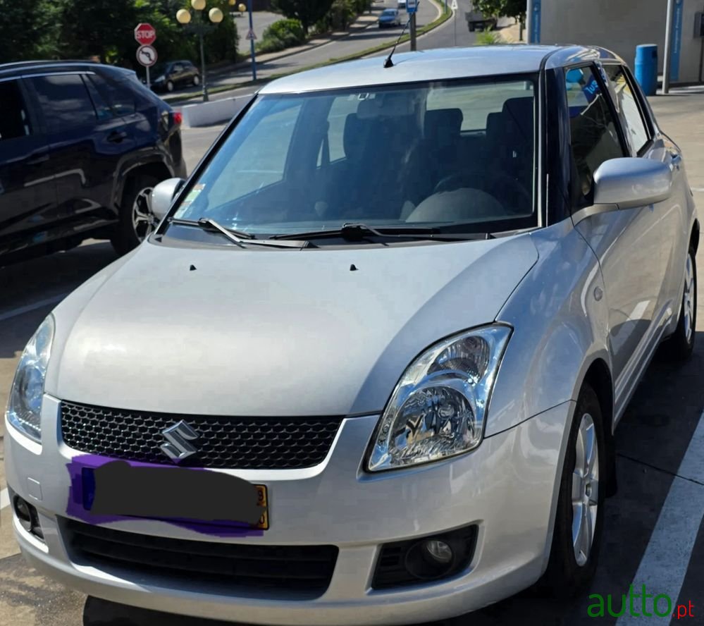 2009' Suzuki Swift 1.3 Ddis Glx photo #3