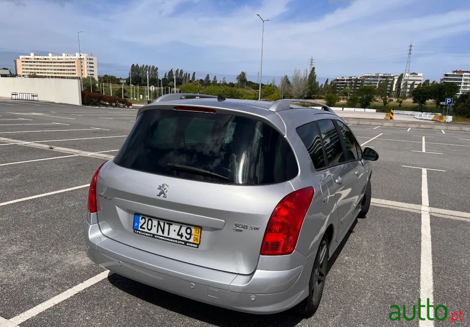 2013' Peugeot 308 Sw photo #2