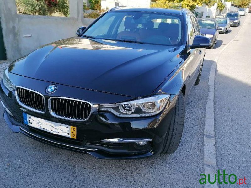 2015' BMW 318 D Touring Luxury photo #2