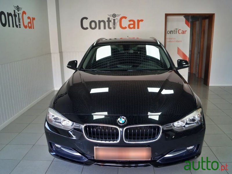 2014' BMW 318 D Touring Auto photo #2