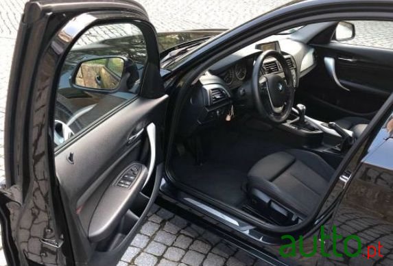 2014' BMW 116 Sport photo #1