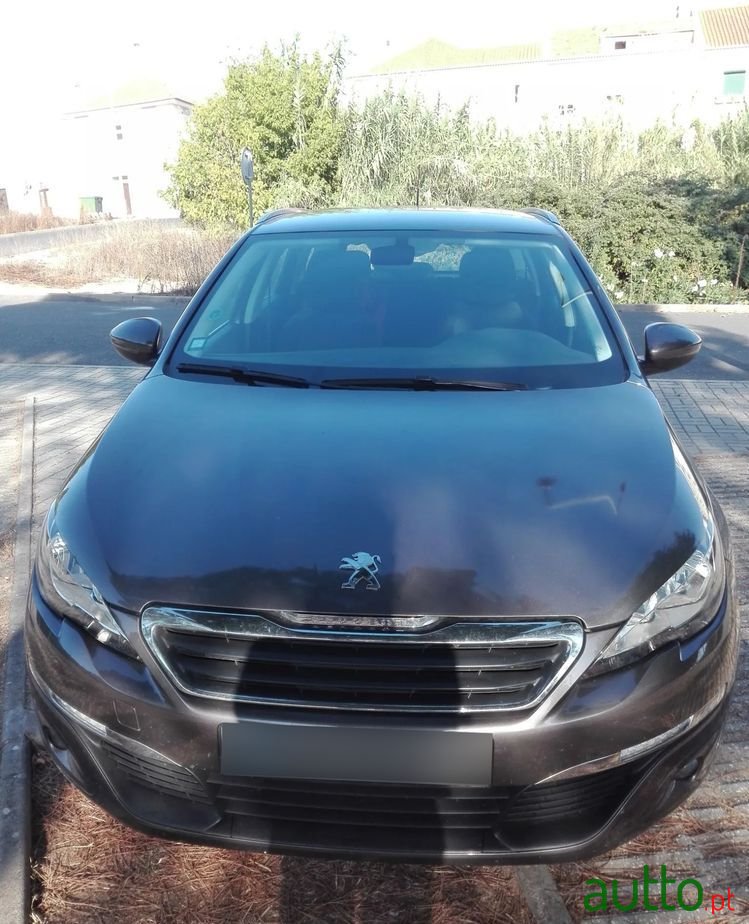 2014' Peugeot 308 Sw photo #1