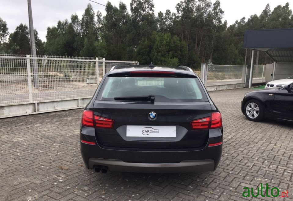 2011' BMW 520 photo #6