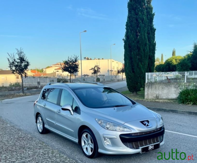 2008' Peugeot 308 Sw photo #1