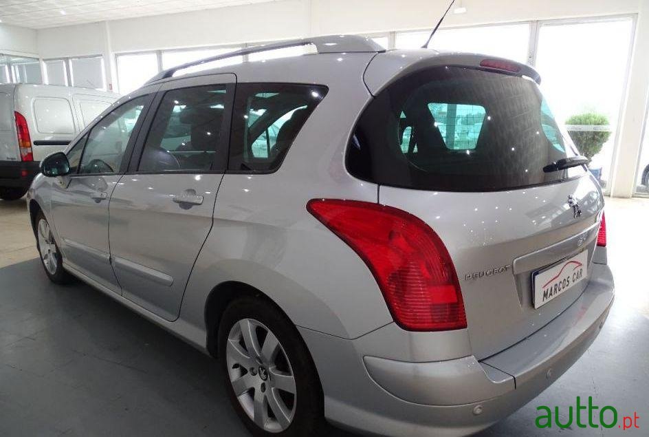 2012' Peugeot 308 Sw photo #1