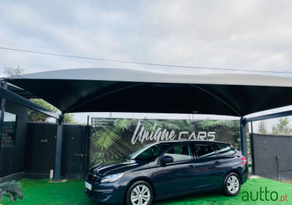 2015' Peugeot 308 Sw photo #1