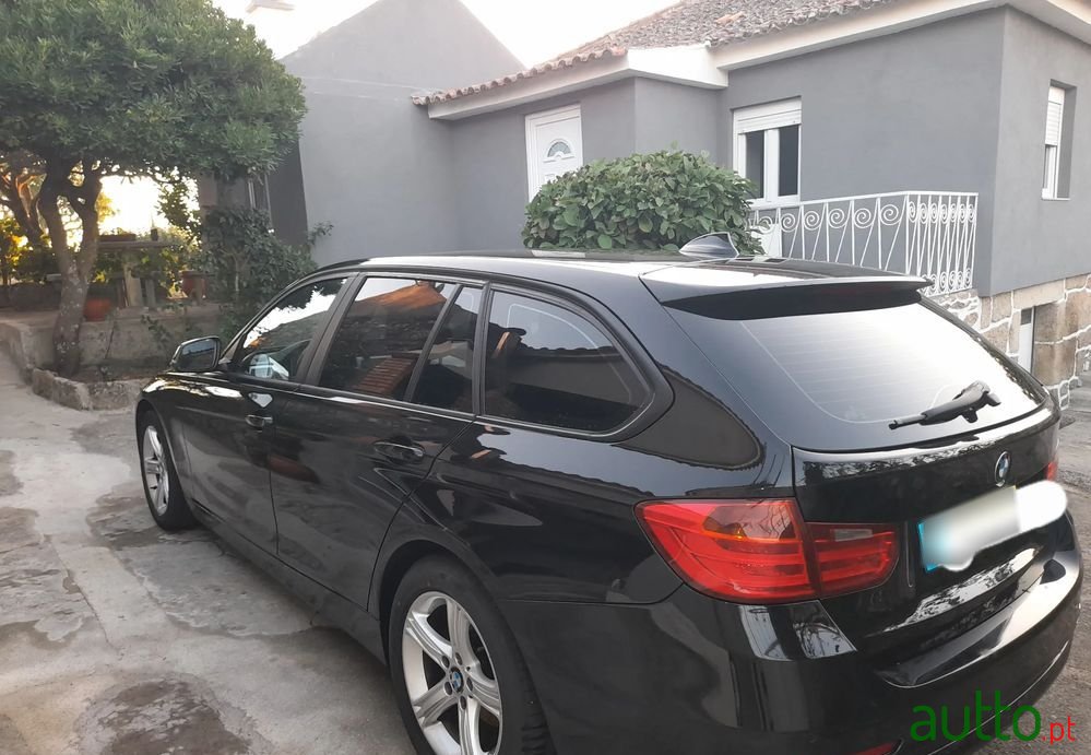 2013' BMW Série 3 D Touring photo #3