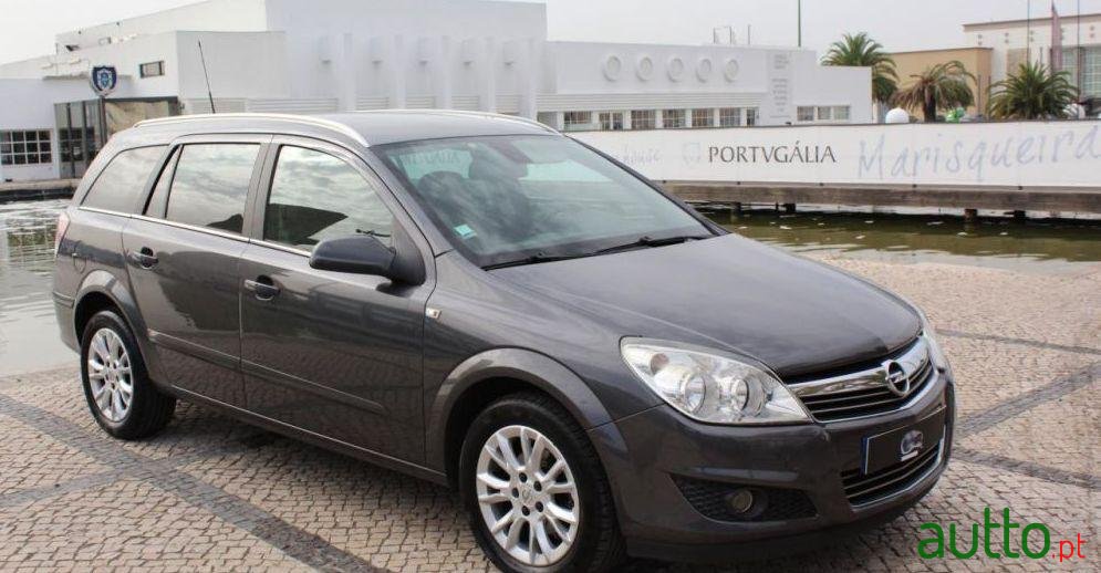 2009' Opel Astra Caravan photo #1