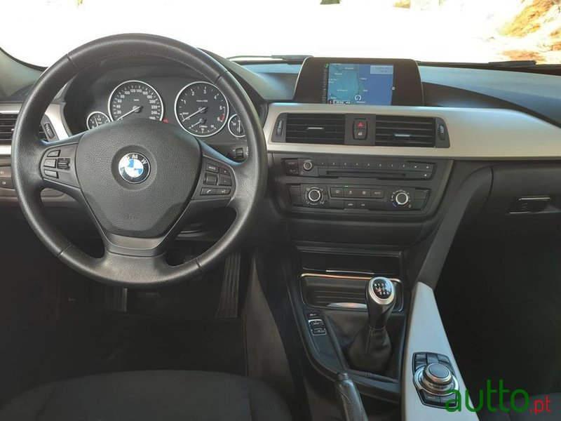 2014' BMW 318 photo #5