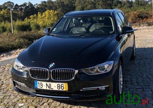 2012' BMW 320 Touring Luxury photo #3