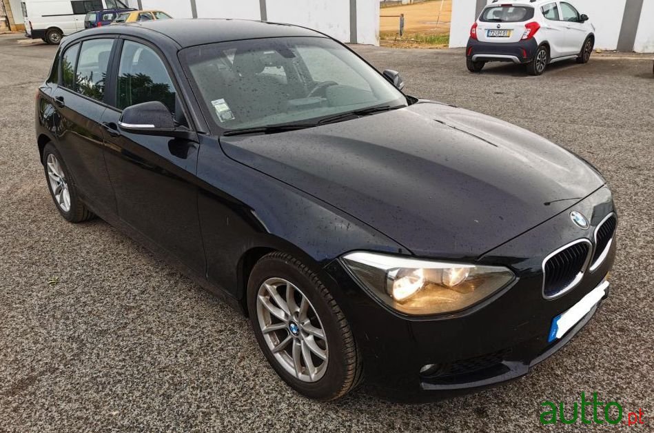 2013' BMW 116 D Line Urban photo #1