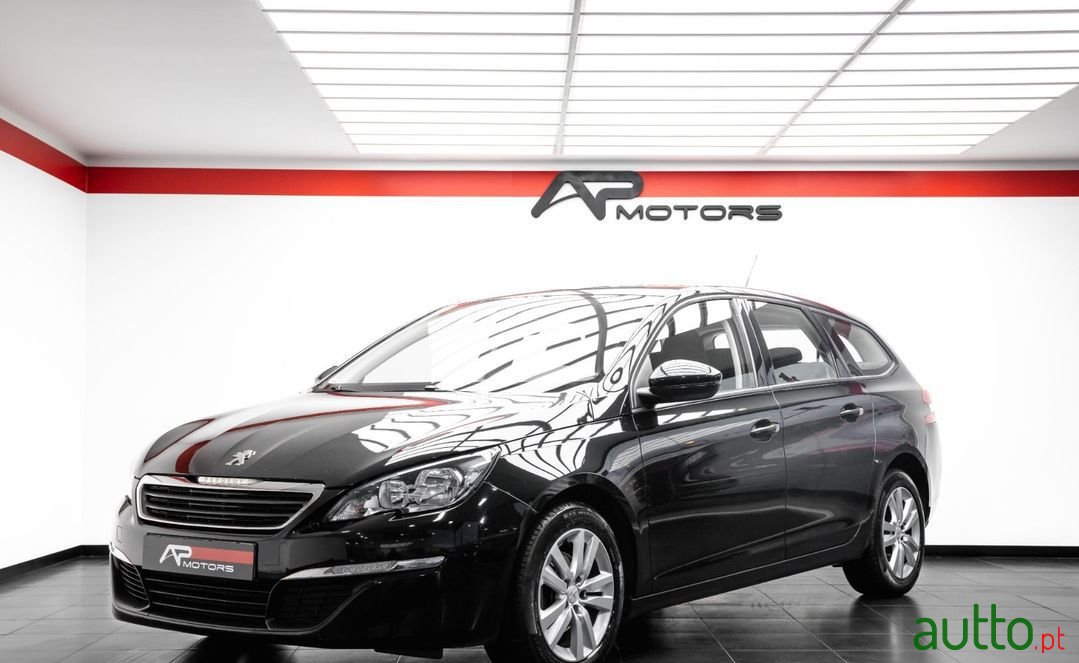 2014' Peugeot 308 Sw photo #1