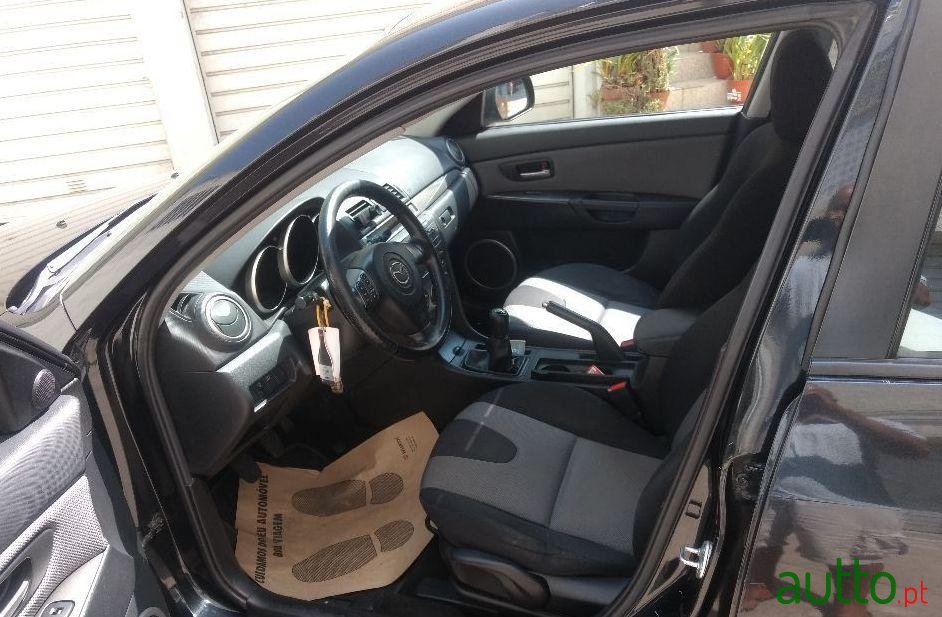 2006' Mazda 3 photo #1