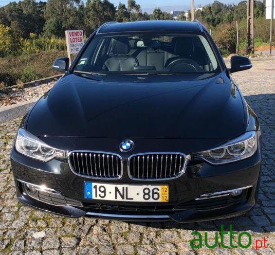 2012' BMW 320 Touring Luxury photo #1