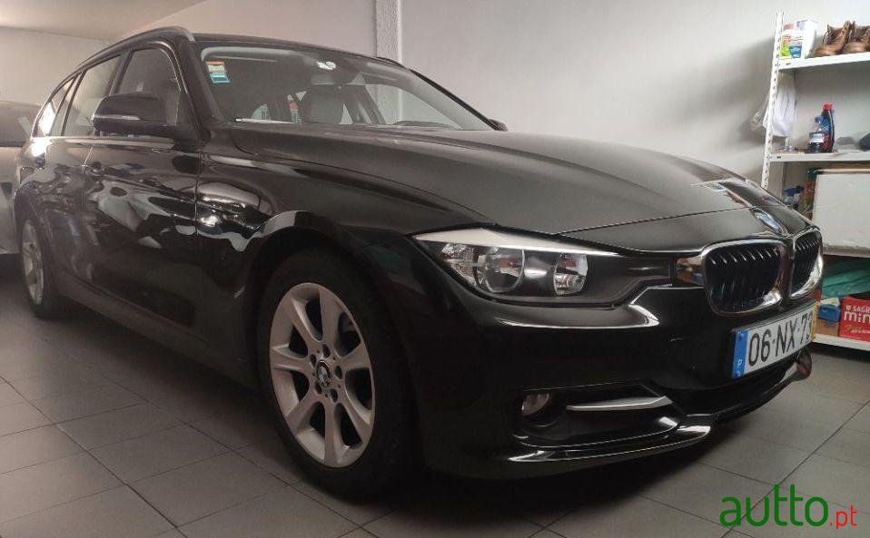 2013' BMW 318 D Touring Line Sport photo #2