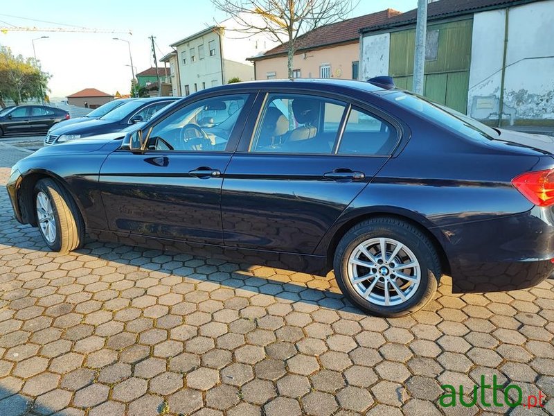 2014' BMW 318 photo #1