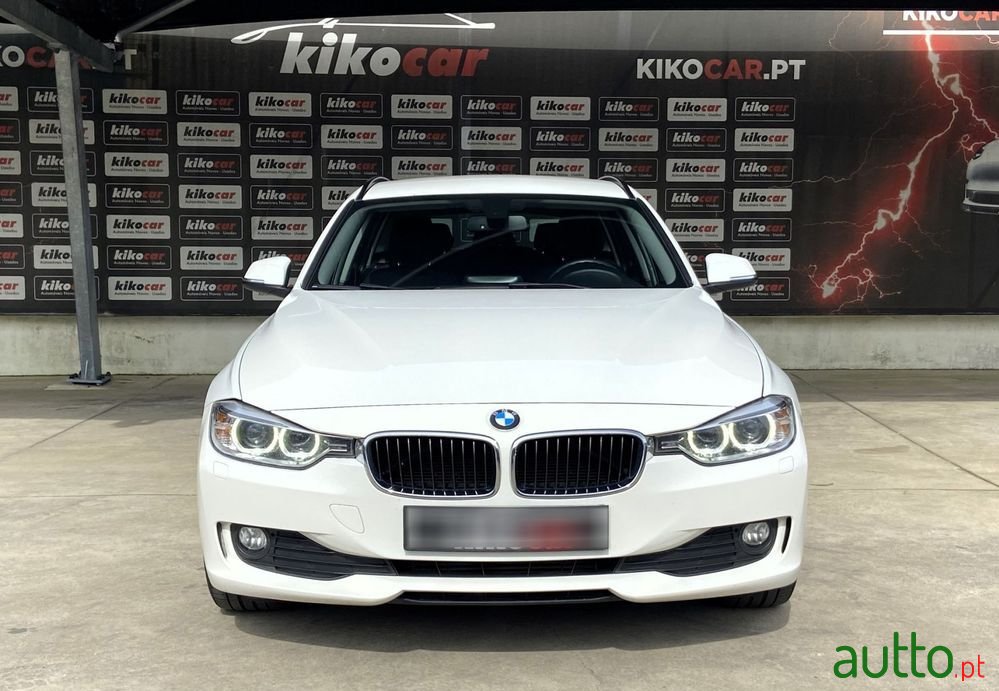 2013' BMW 318 D Touring photo #2