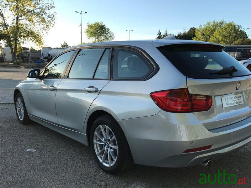 2014' BMW 318 D Touring photo #2