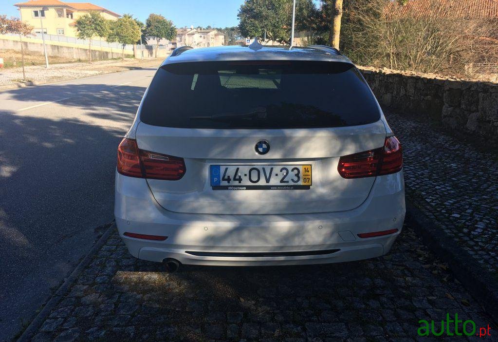 2014' BMW 318 D Touring Line Sport photo #1