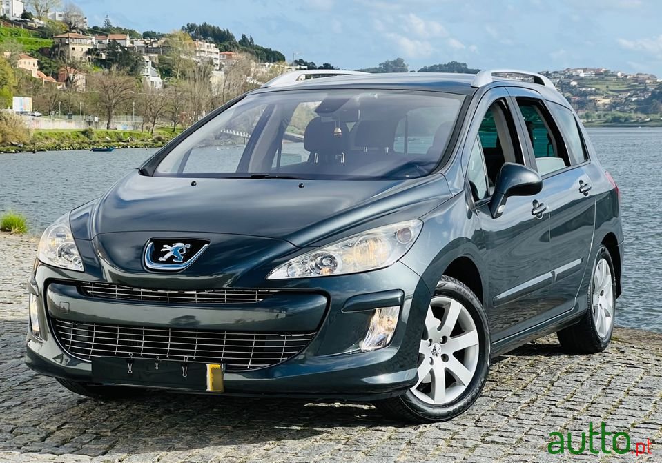 2009' Peugeot 308 Sw photo #1