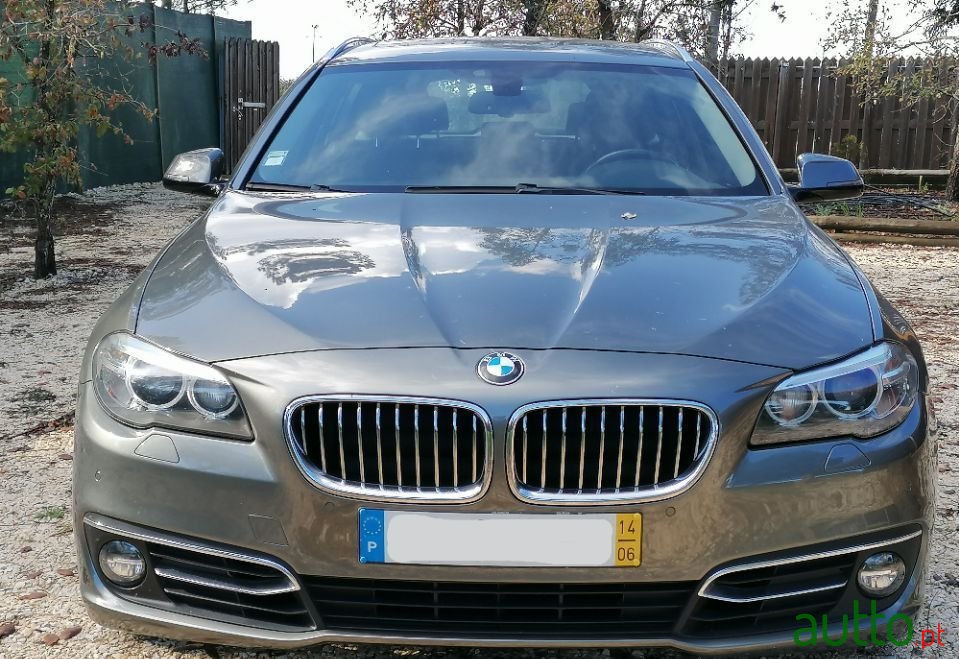 2014' BMW 520 photo #1