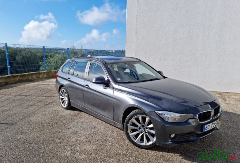 2014' BMW 318 photo #1