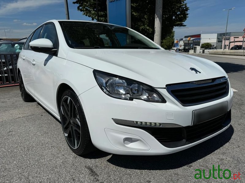 2015' Peugeot 308 Sw photo #1