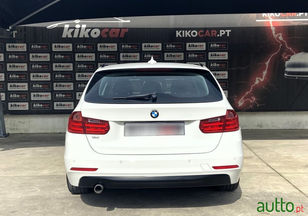 2013' BMW 318 D Touring photo #6