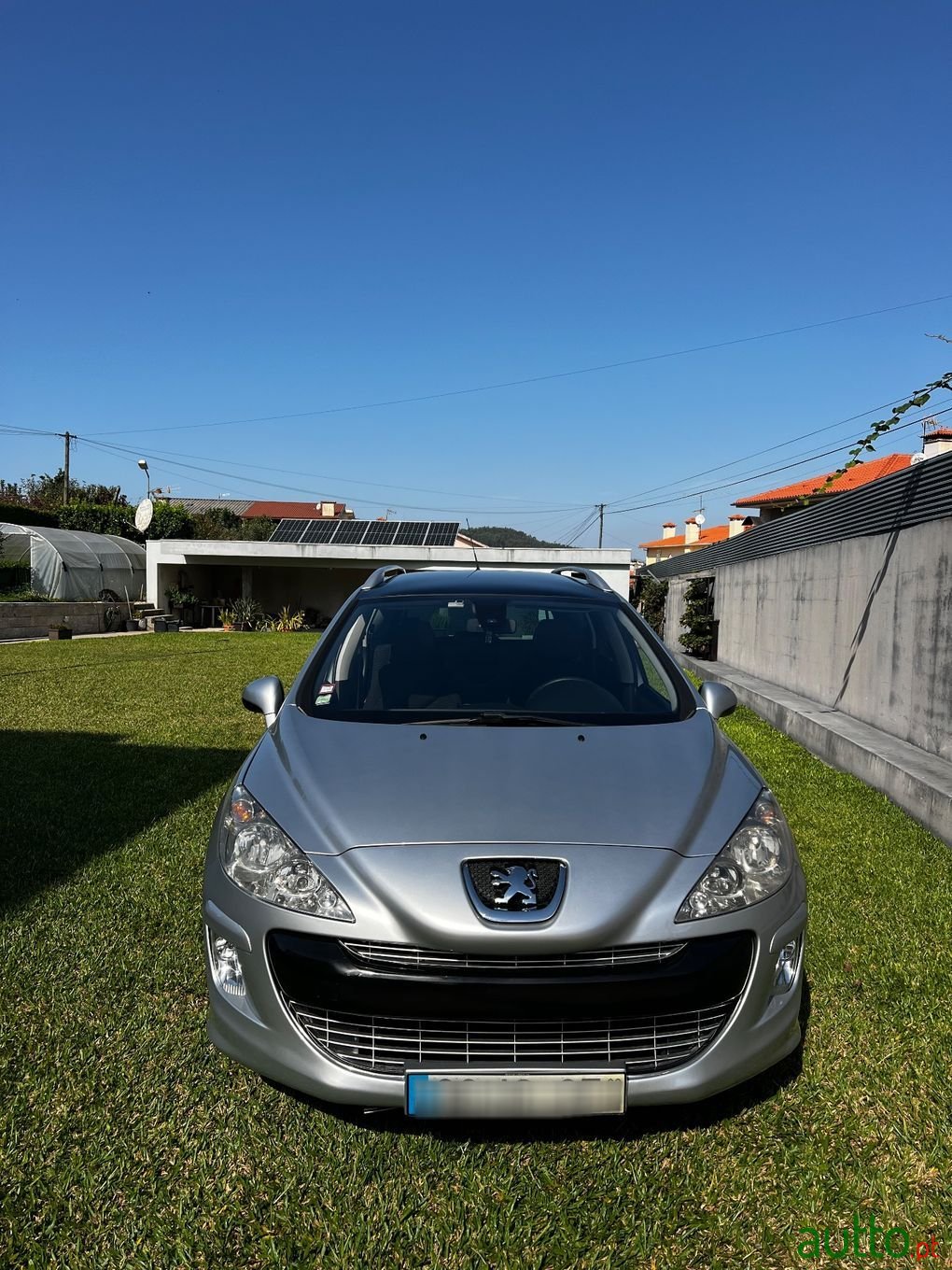 2009' Peugeot 308 Sw photo #1