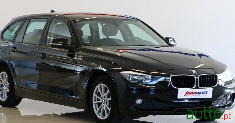 2013' BMW 318 d Touring Navi photo #2