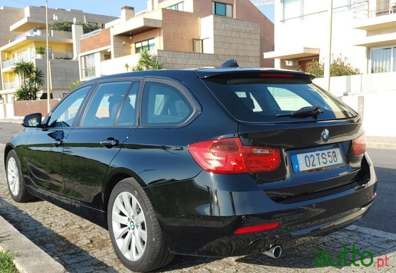 2013' BMW 318 photo #2