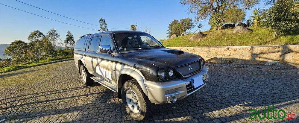 2004' Mitsubishi L200 photo #1