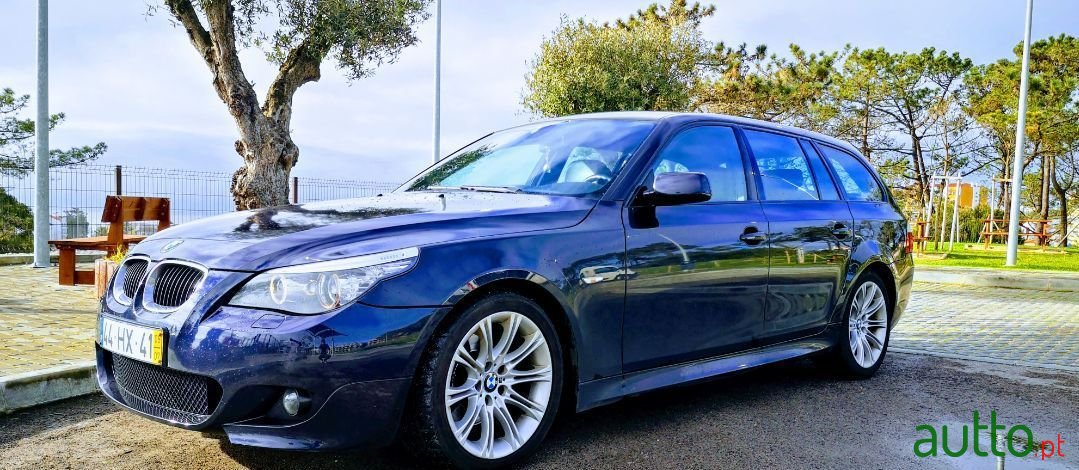 2009' BMW 520 photo #1