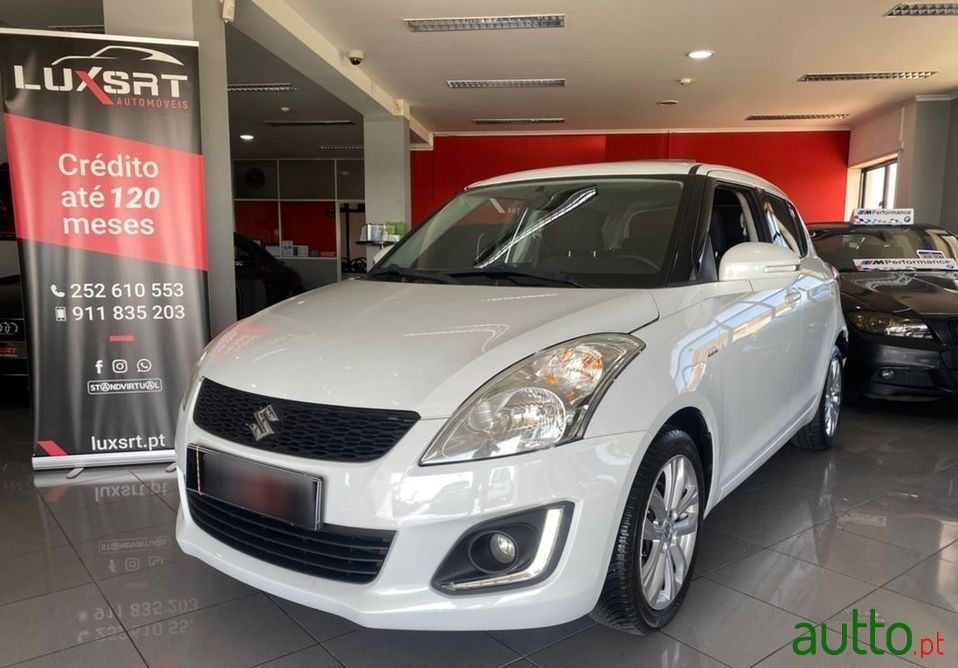 2015' Suzuki Swift photo #1