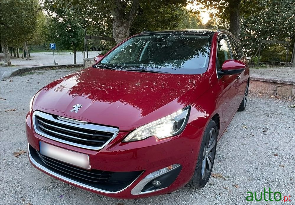2014' Peugeot 308 Sw photo #1