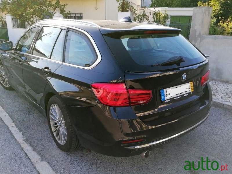 2015' BMW 318 D Touring Luxury photo #1