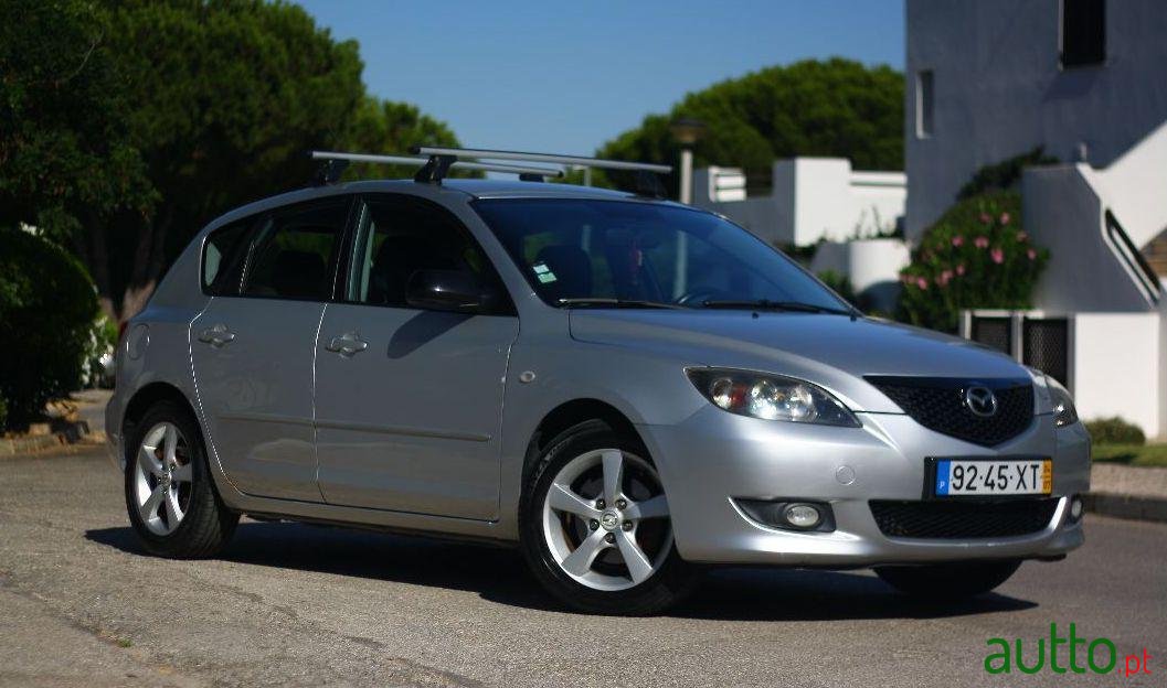 2004' Mazda 3 photo #1