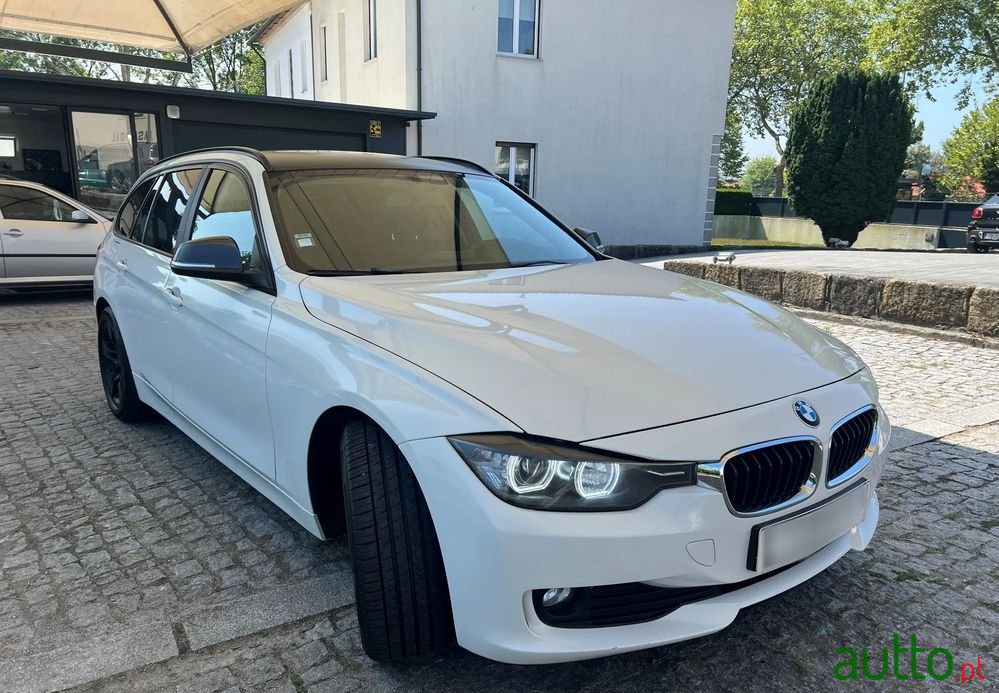 2014' BMW 318 D photo #3