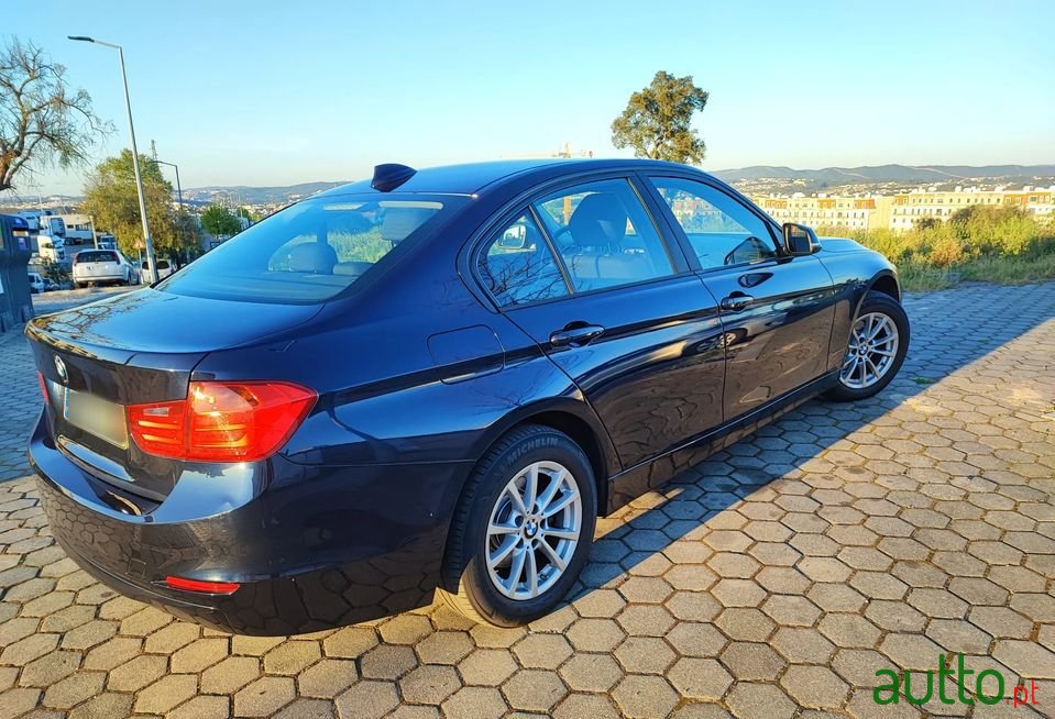 2014' BMW 318 photo #2
