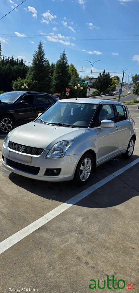 2009' Suzuki Swift 1.3 Ddis Glx photo #2