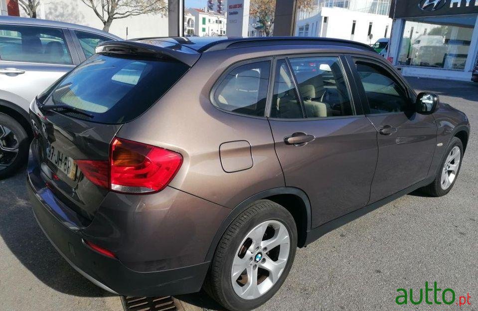 2010' BMW X1 118 D photo #4