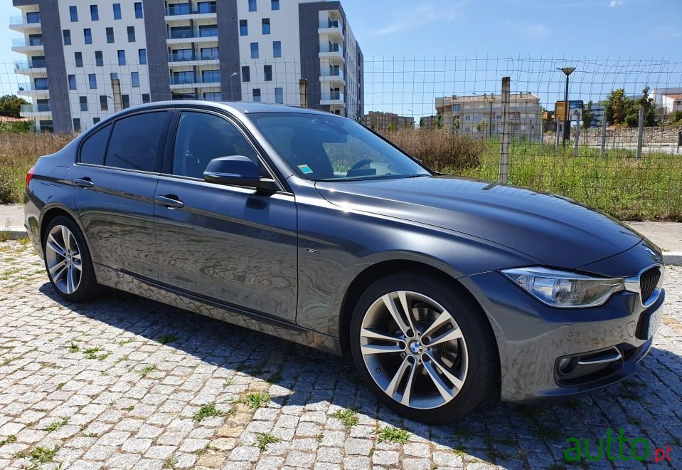 2014' BMW 318 Sport photo #1