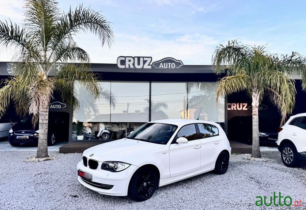 2009' BMW 116 D photo #1