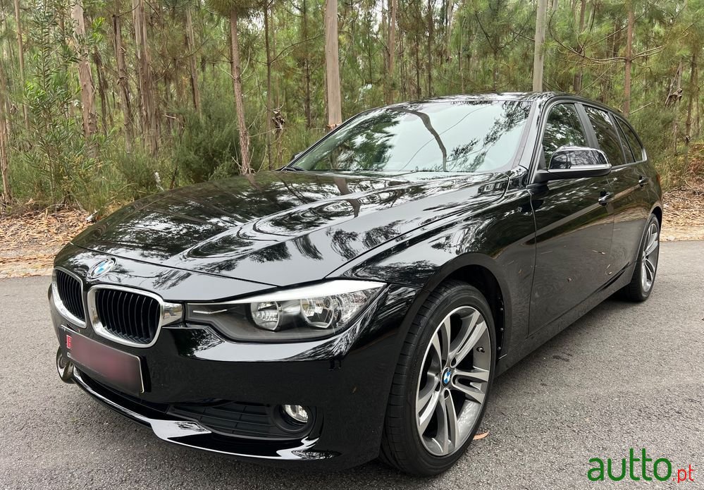 2015' BMW Série 3 D Touring photo #1