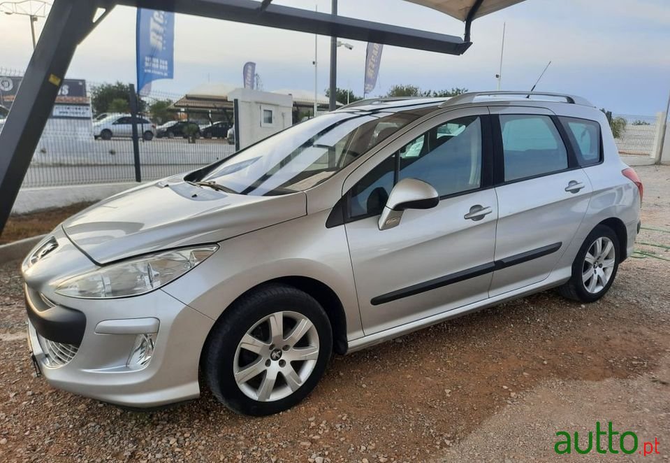 2009' Peugeot 308 Sw photo #1