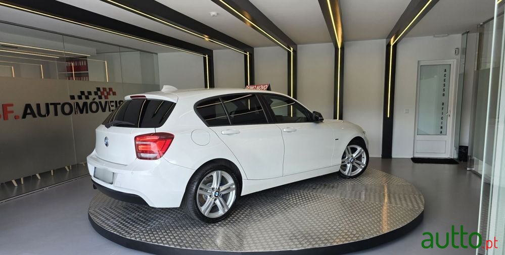 2011' BMW 116 I Line Sport photo #5