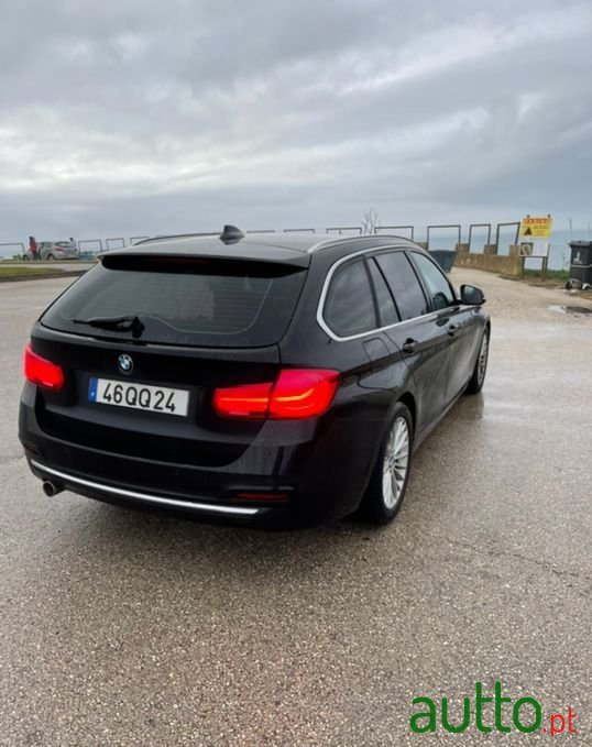 2015' BMW 318 photo #2